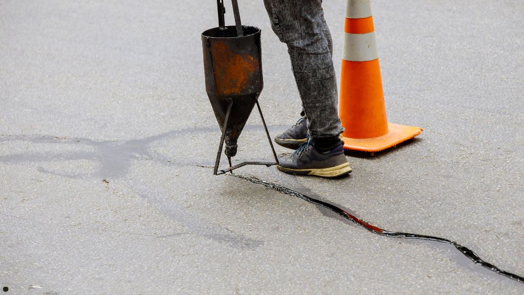 crack filling driveway asphalt before winter sealcoating